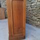 Oak workshop furniture with sliding doors.