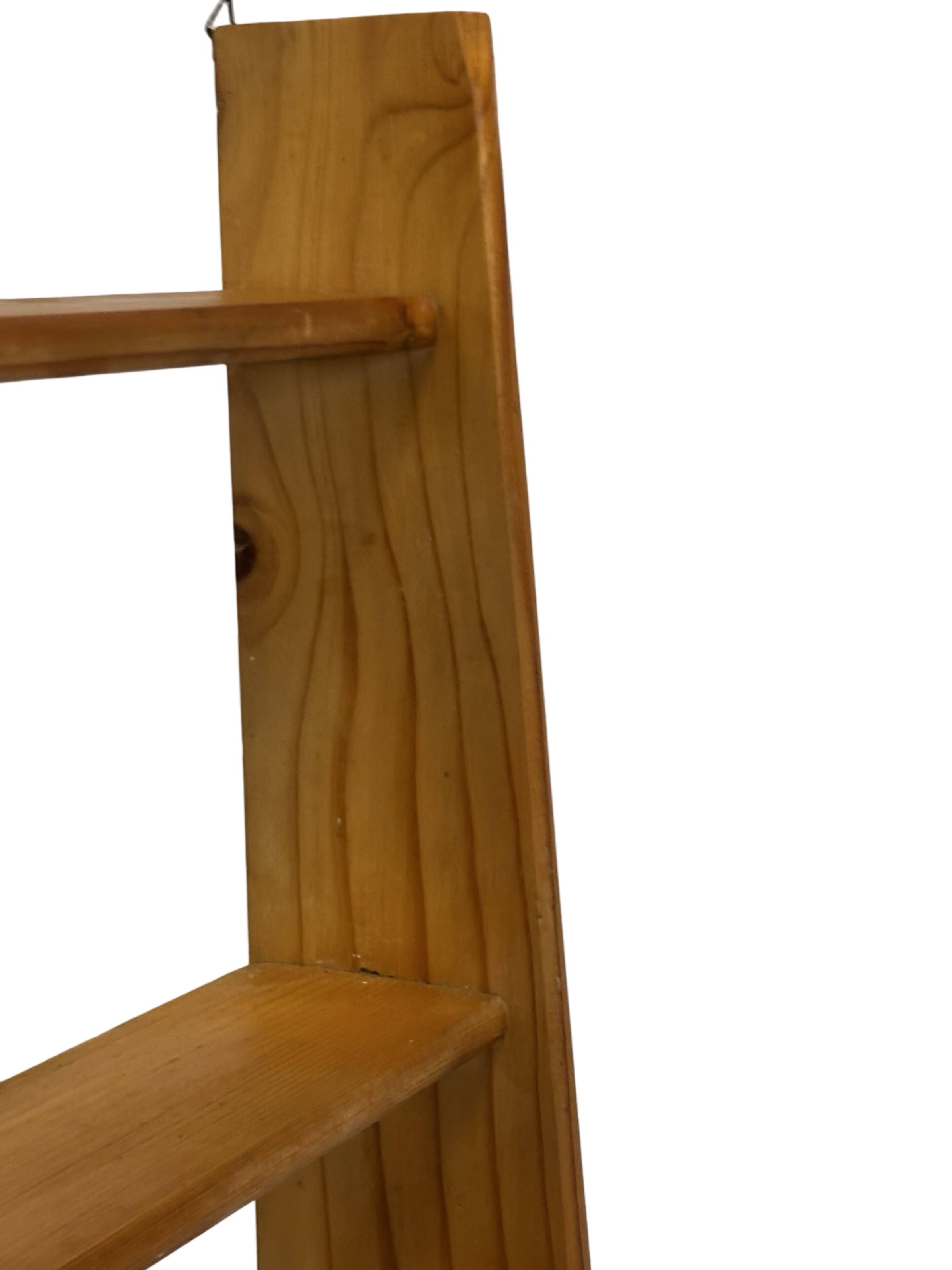 Vintage wooden wall shelve rack bookshelf in pinewood minimalist design