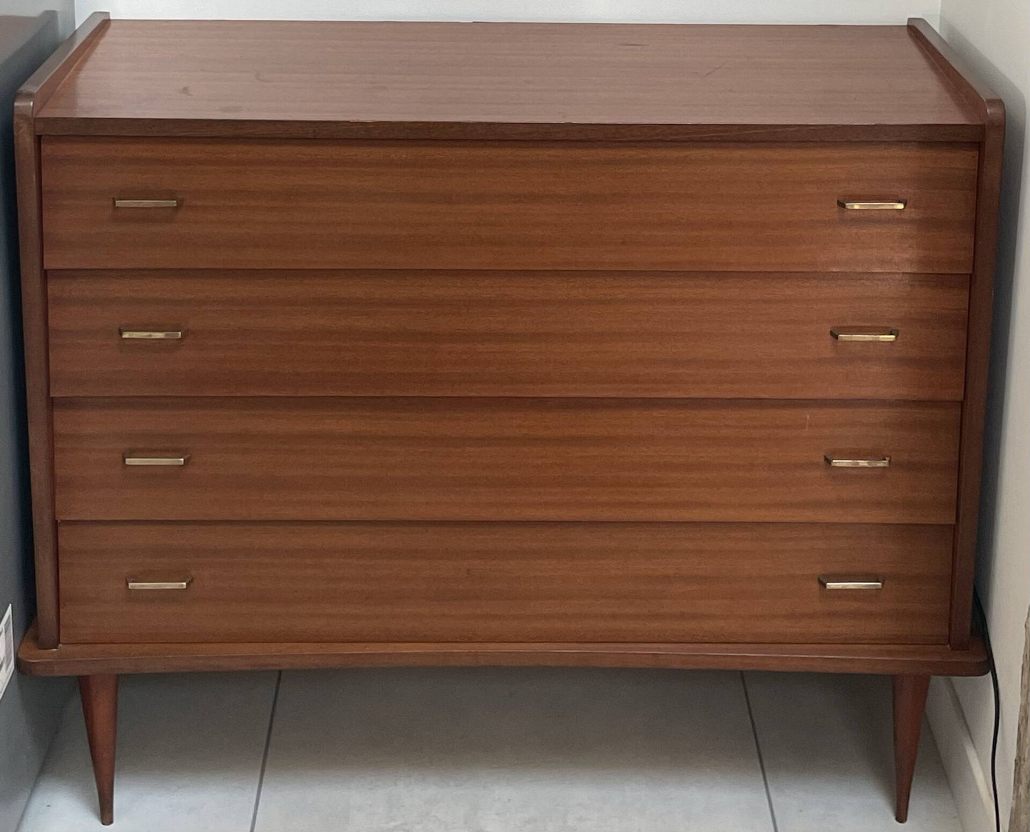 Vintage chest of drawers with 4 drawers and tapered legs by Simmob (1960s/1970s)