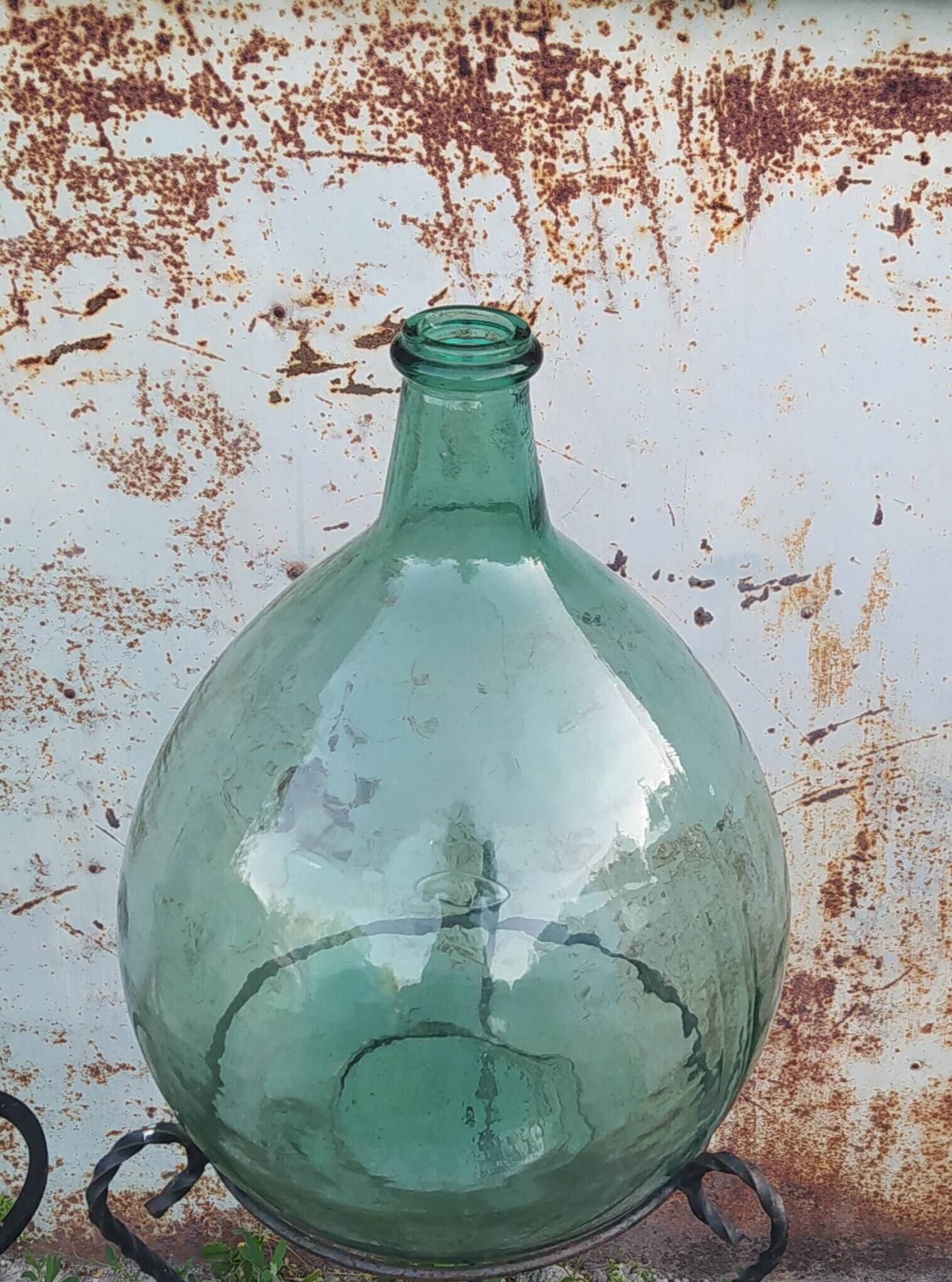 Give me an old green glass bottle jar.