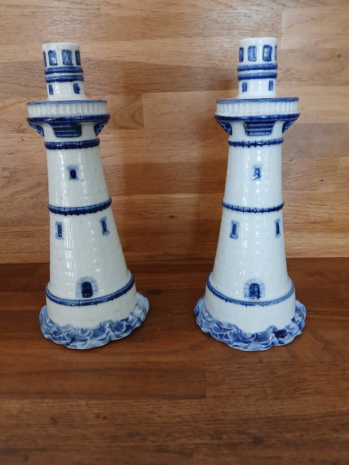 Pair of lighthouse-shaped candle holders
