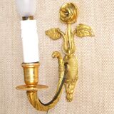 Simple wall sconce in classic Empire style made of vintage French cast brass 4316.