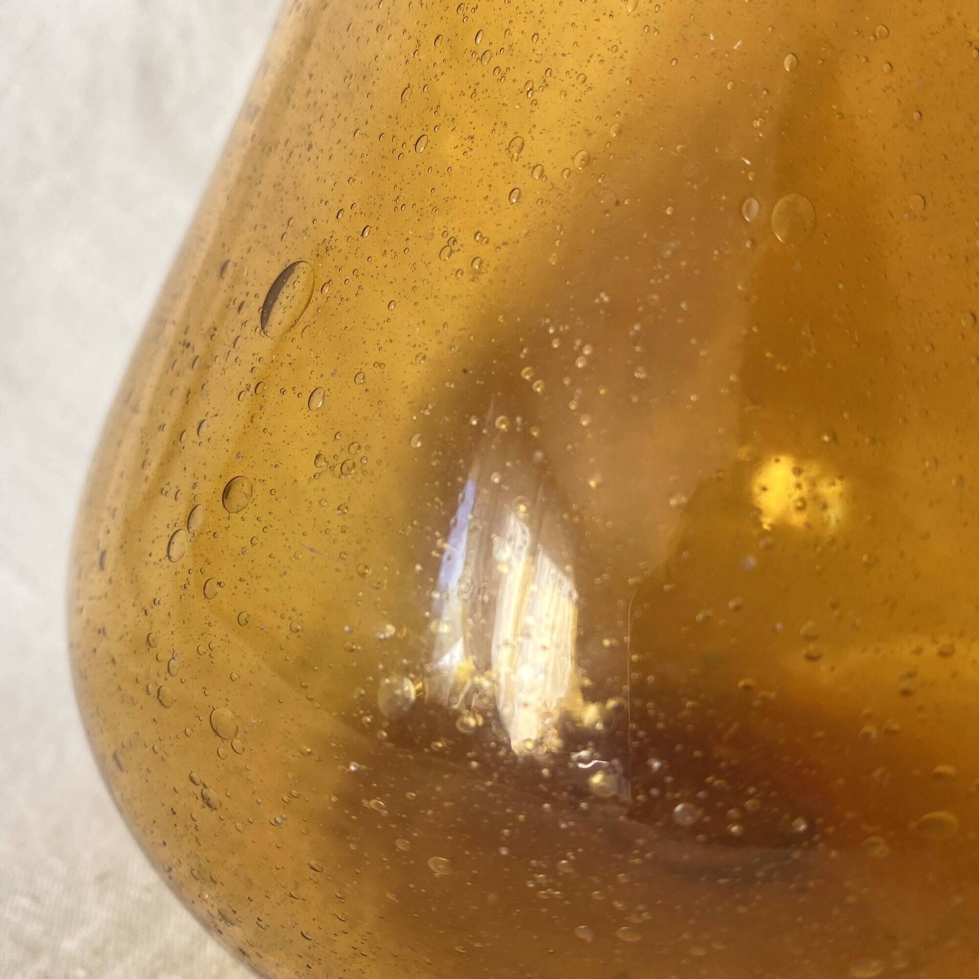 Blown glass jug with caramel bubbles