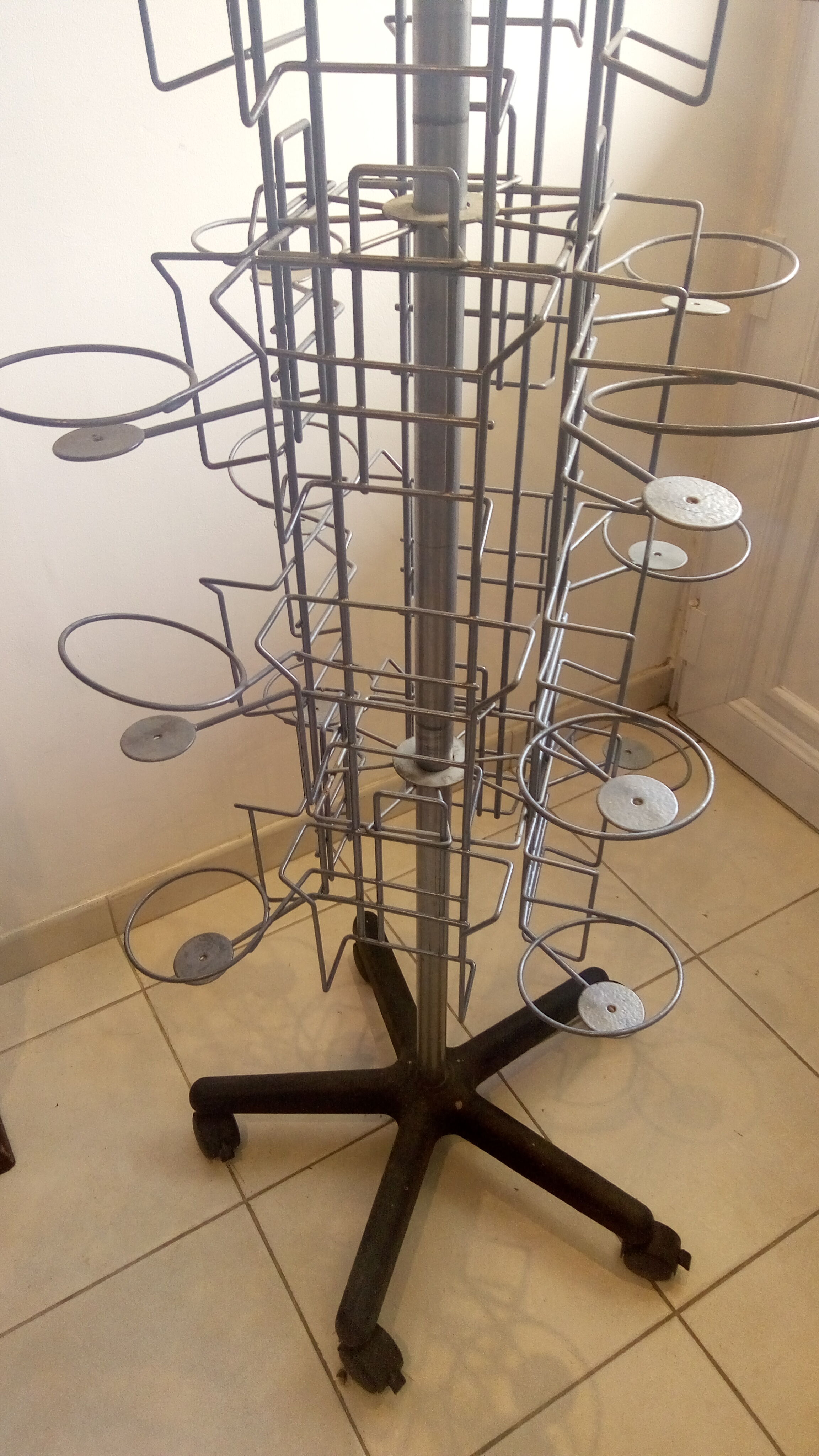 Atypical turnstile for postcards and books