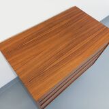 Vintage Scandinavian modernist chest of drawers in rosewood and black metal.