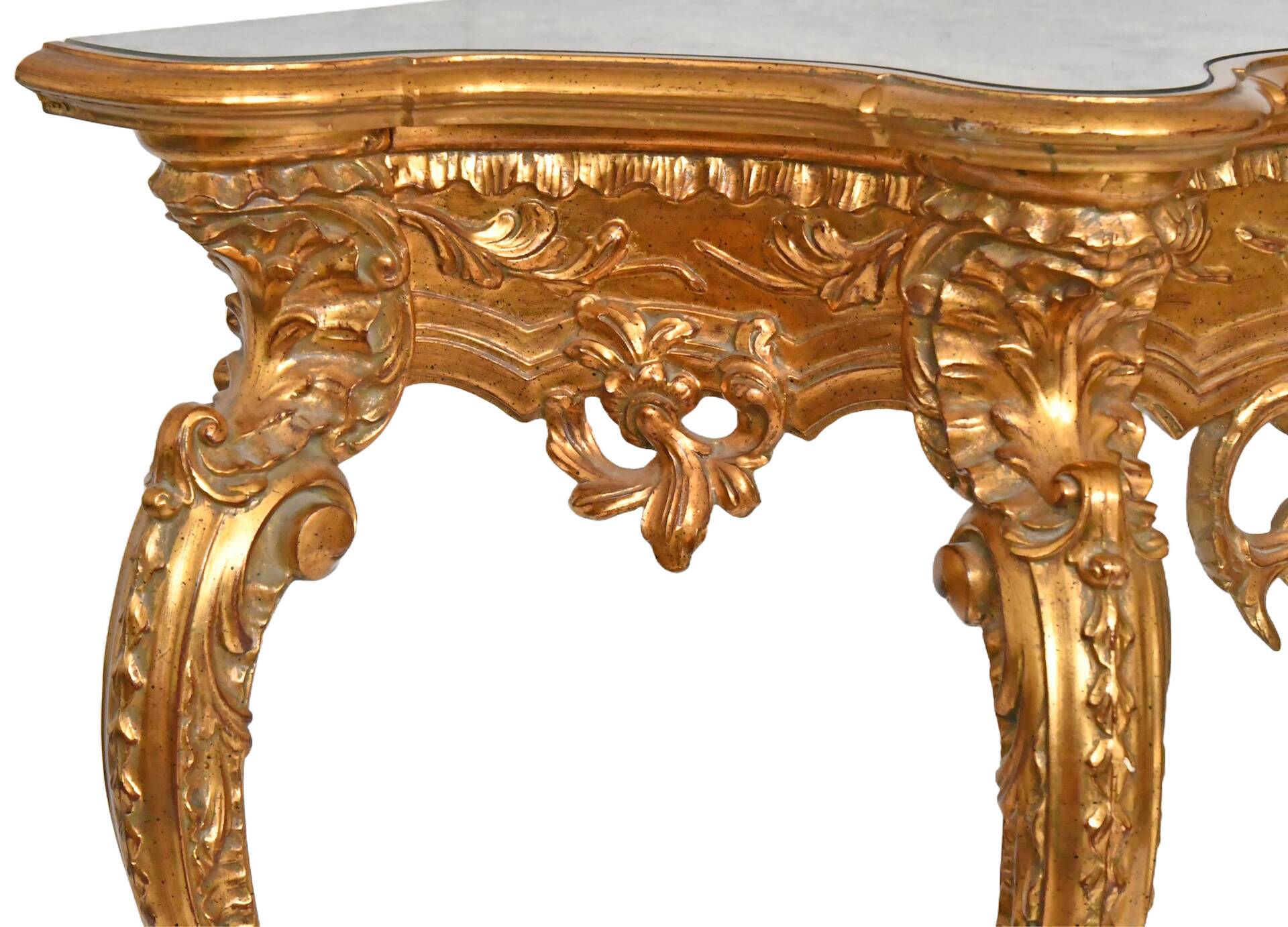 Console with a gilded wooden mirror.