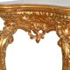 Console with a gilded wooden mirror.