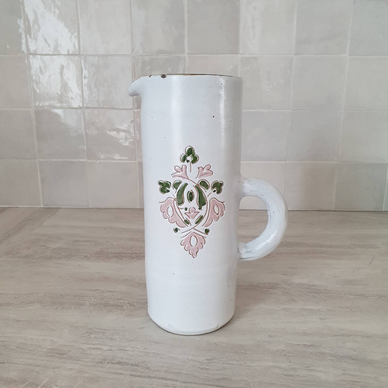 Large white jug with a pink pattern
