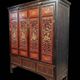 China 19th century: Red lacquer cabinet with gilding from the Qing Dynasty.