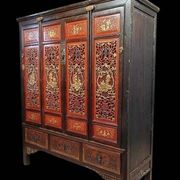 China 19th century: Red lacquer cabinet with gilding from the Qing Dynasty.