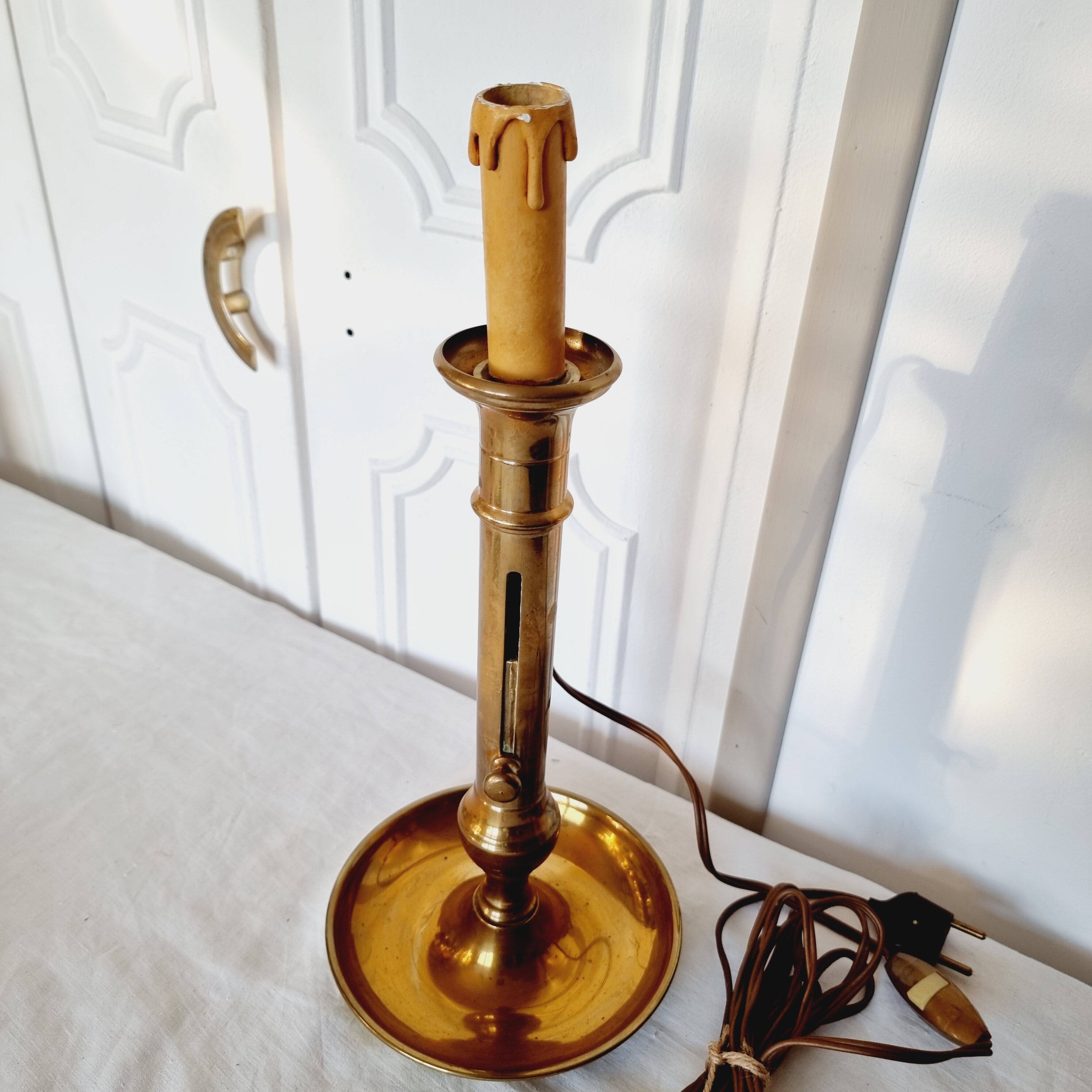 Brass table lamp made from an antique 19th century candlestick or candle holder.