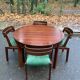 Scandinavian dining table and 4 Hans Olsen style chairs in teak and velvet.