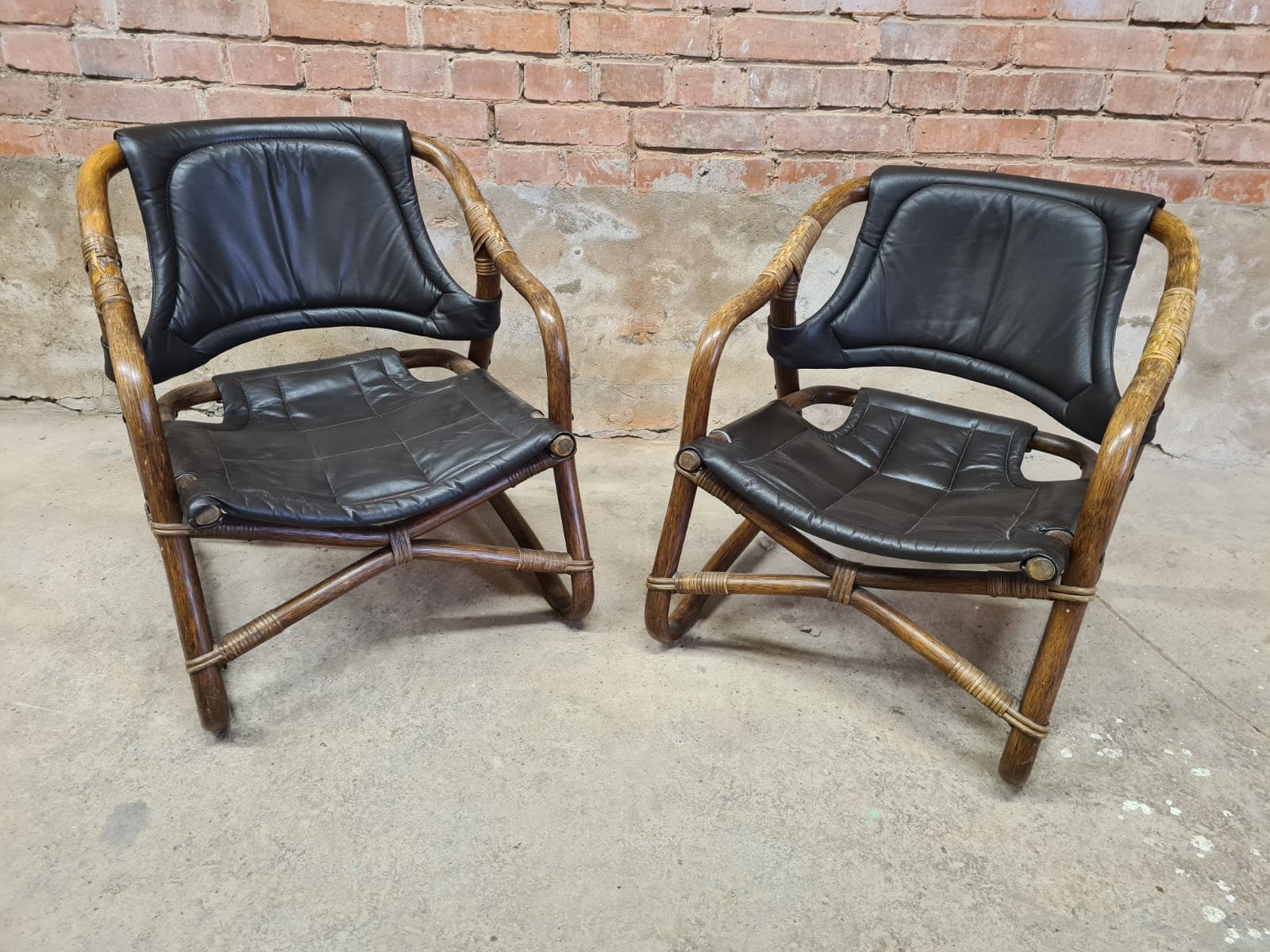 Pair of vintage skaï bamboo armchairs