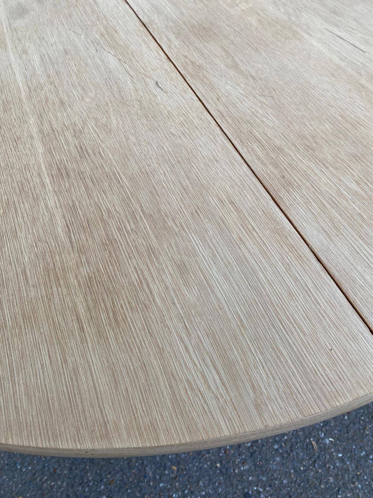 Renovated Scandinavian dining table in solid oak with a central leg from the 1970s.