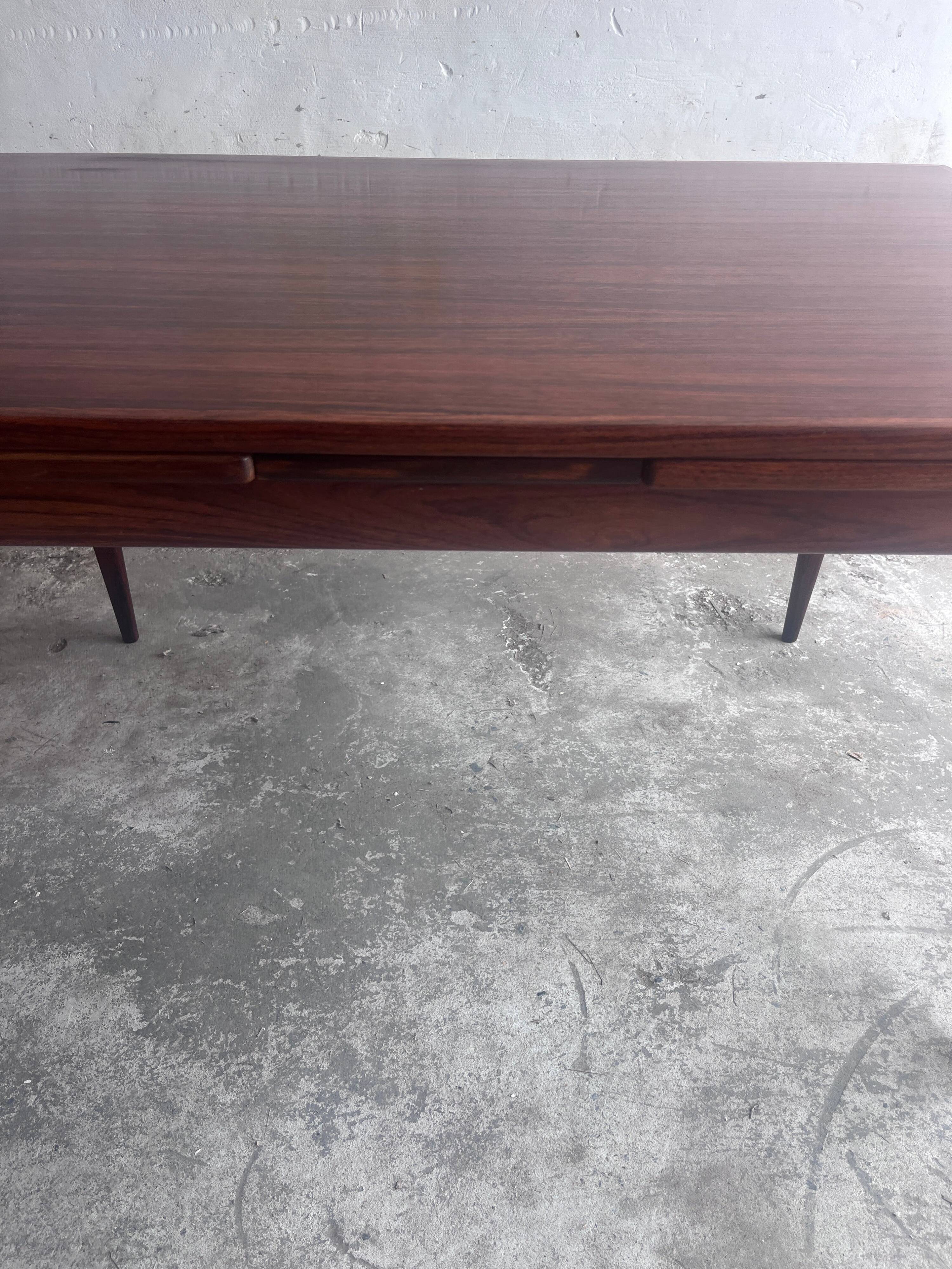 Danish extendable dining table in rosewood by Niels O. Møller, model 254, Denmark, 1960s.