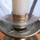 In brass and glass candleholder