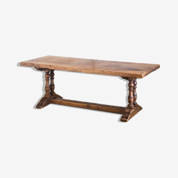 Old coffee table in solid oak wood. France, early twentieth century.