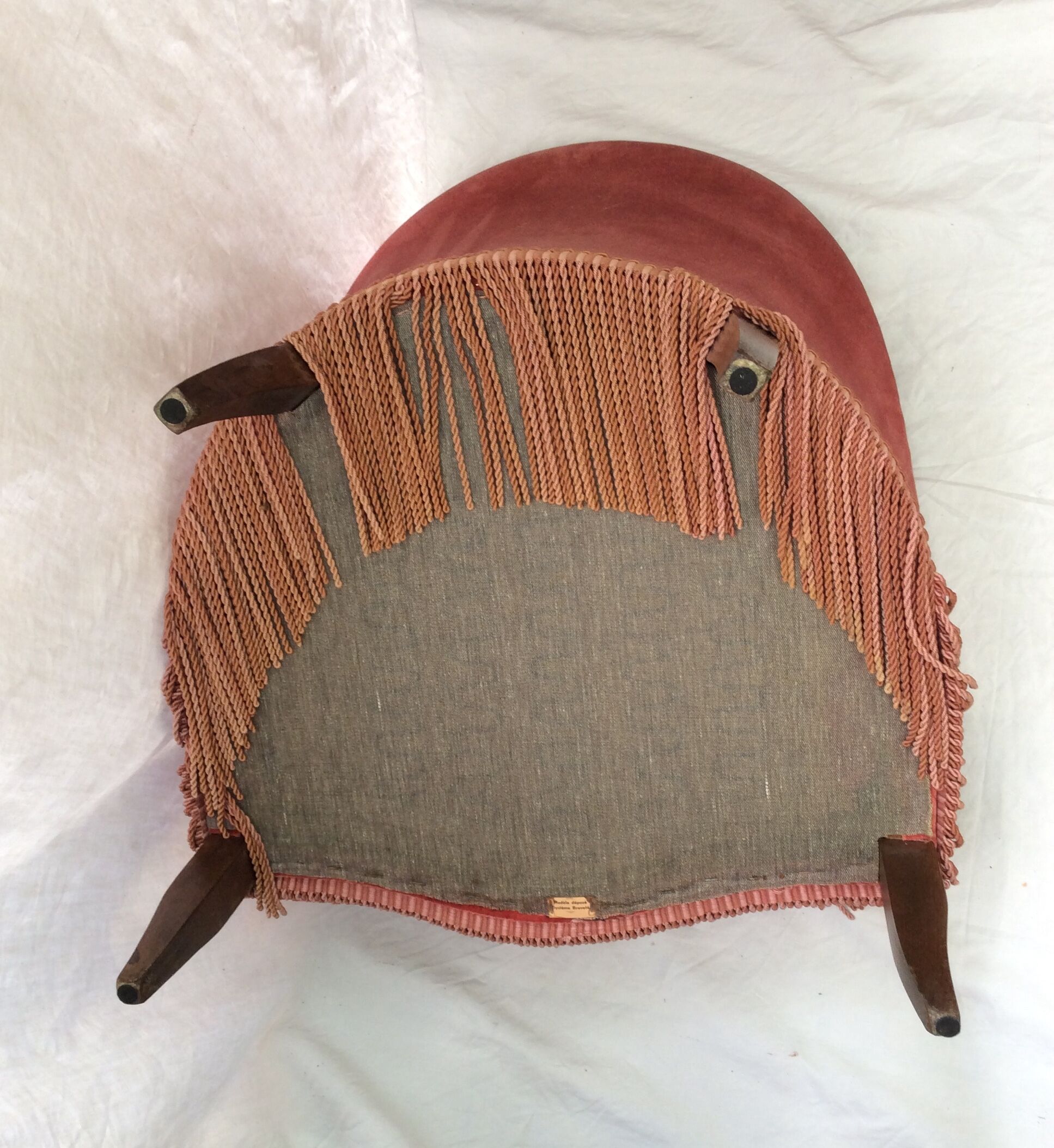 Pink velvet toad chair in the 1960s