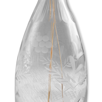 Chiseled glass decanter, vegetal decoration
