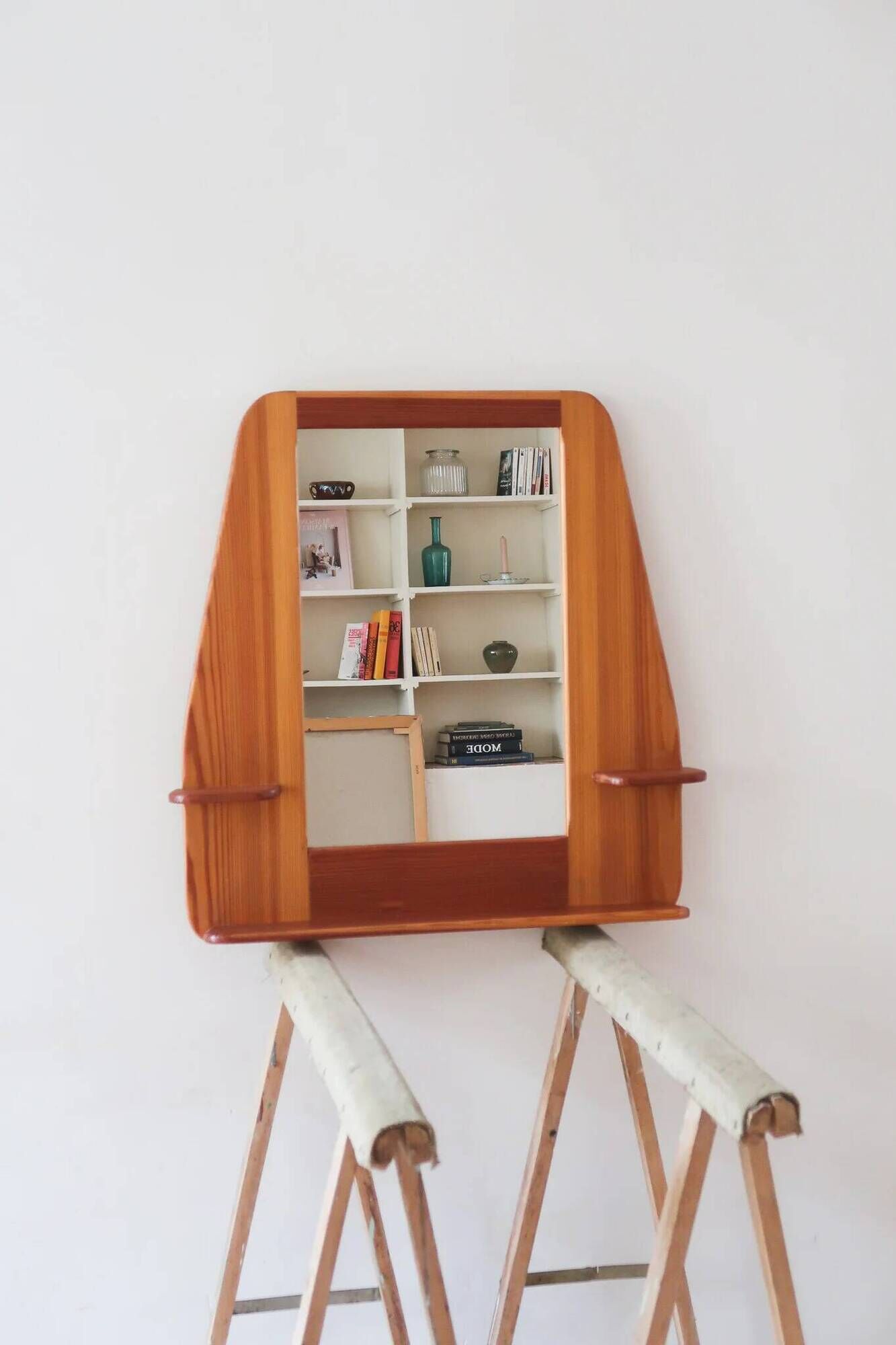 Wall mirror with a solid pine frame, integrated shelf.