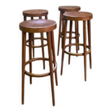 4 vintage Baumann bar stools in varnished beech - 1950s/1960s