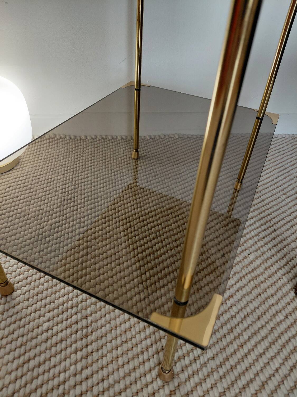 Modernist brass and smoked glass table - 1970s gallery style.