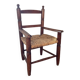 Vintage wooden armchair and straw seat for children