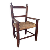Fauteuil vintage en bois et assise paillée pour enfant