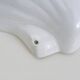 Pair of shell wall lights, in white ceramic. 80s 90s