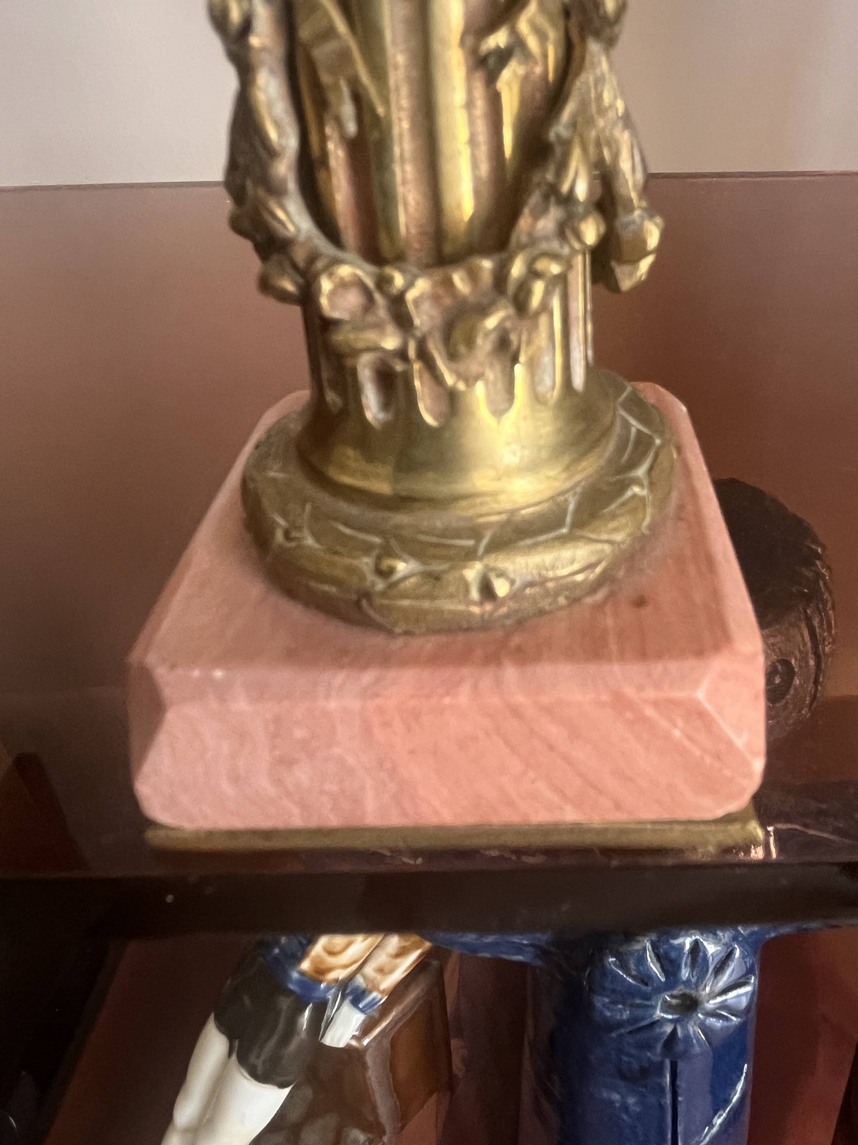 pair of antique bronze candlesticks