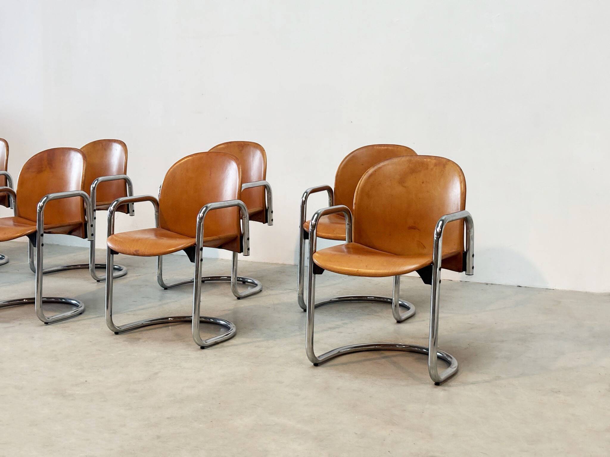 Set of eight cognac leather Dialogo Dessau dining chairs by Afra E Tobia Scarpa