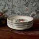 Composition de 9 assiettes plates terre de fer Badonviller et Digoin