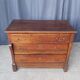 Cross-legged commode from the Restoration period in walnut.