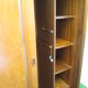 Teak cabinet with shuttered sliding door