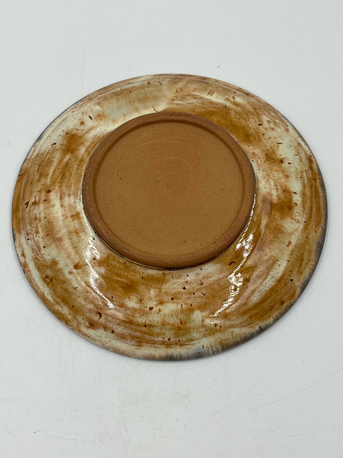 Red earthenware dessert plate