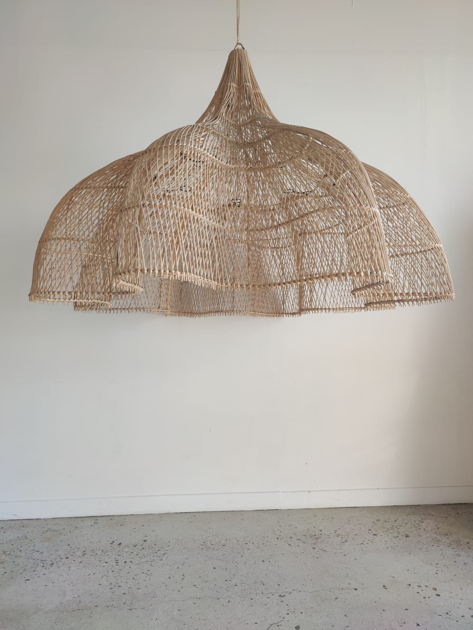 Huge rattan suspension in the shape of a corolla H:1m; D: 1m50
