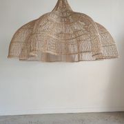 Huge rattan suspension in the shape of a corolla H:1m; D: 1m50