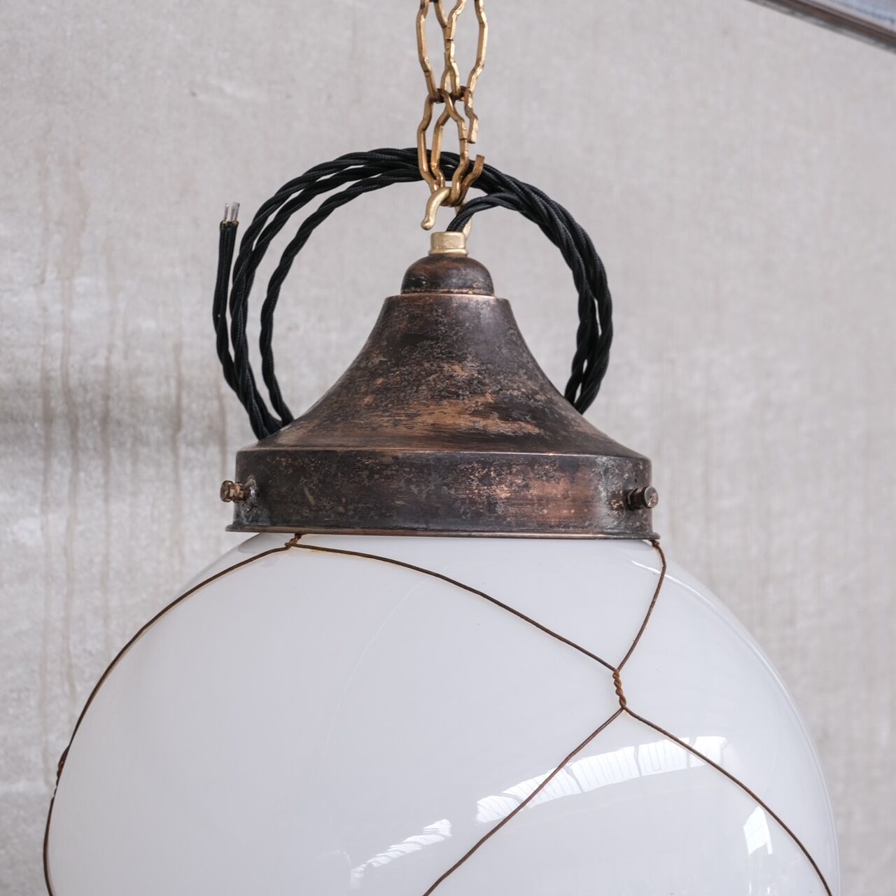 Opaline and brass mid-century caged pendant