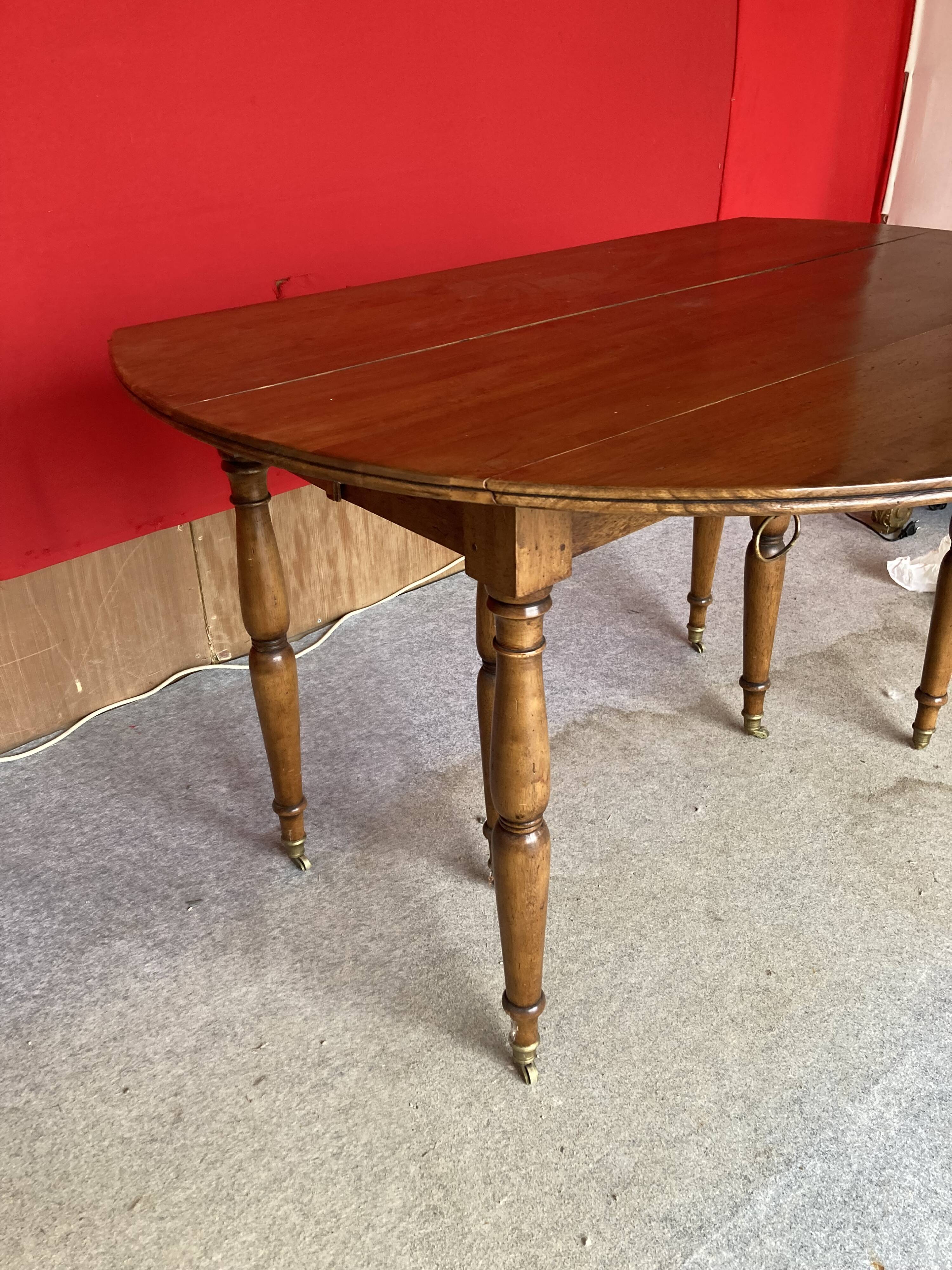 Cherry wood drop-leaf table.