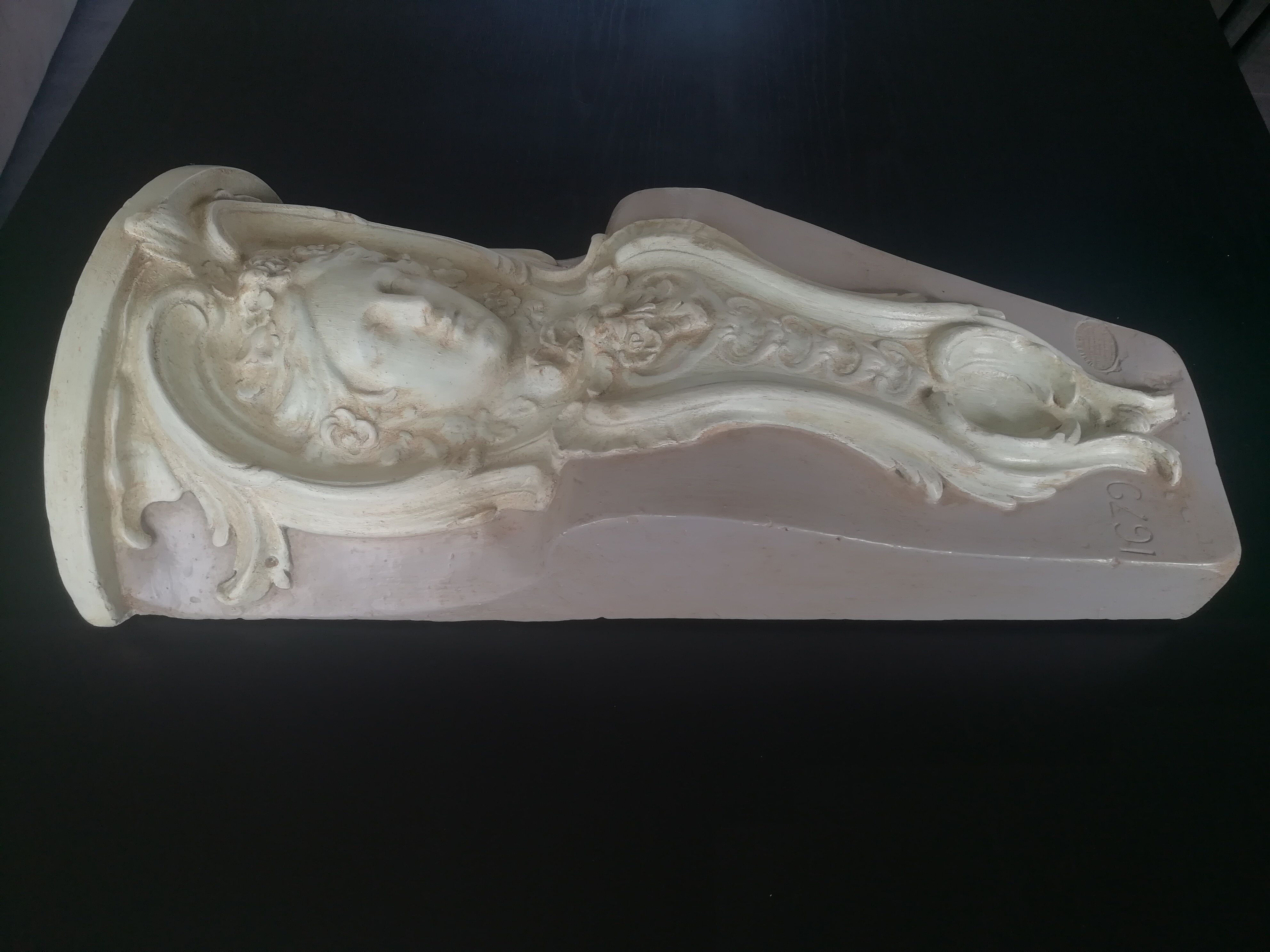 Patinated plaster wall cariatide console