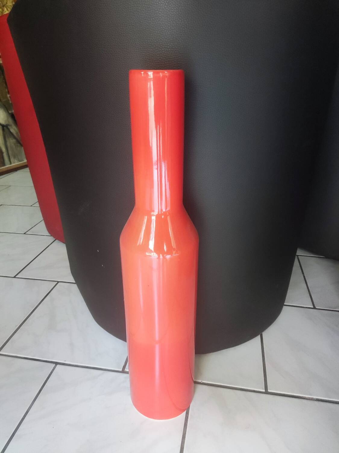 Red glazed stoneware vase