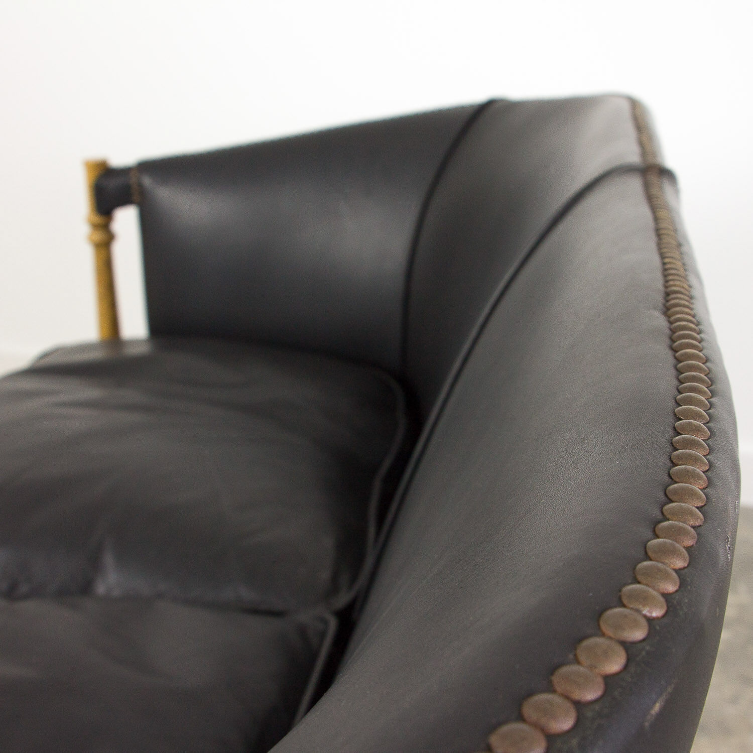 Black leather club sofa