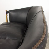Black leather club sofa