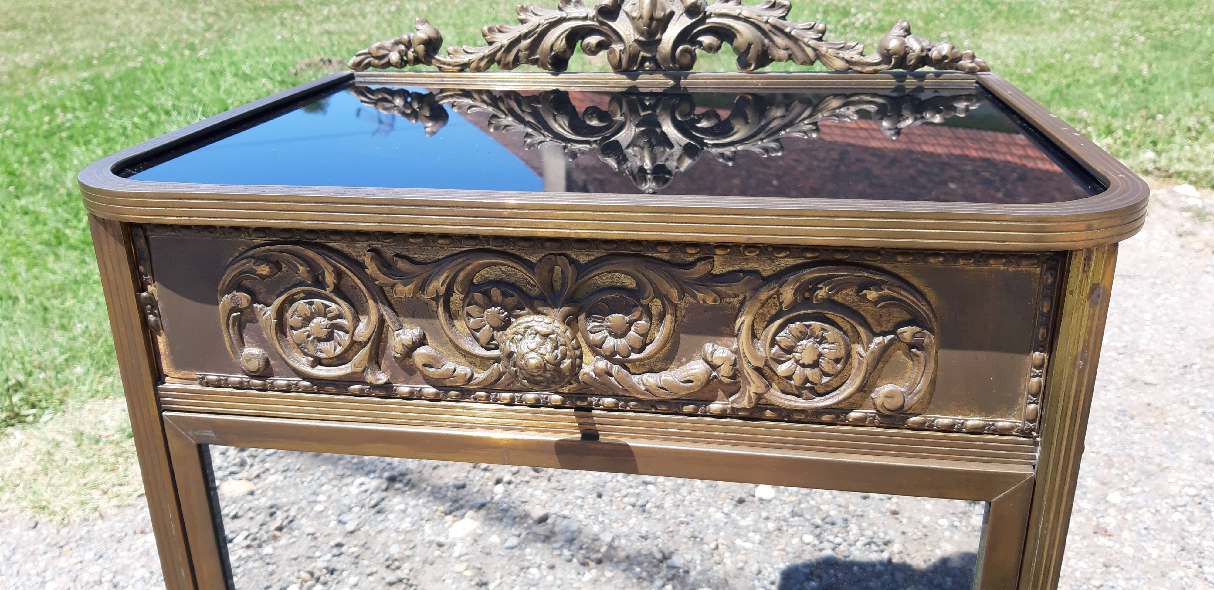 Golden metal empire style bedside