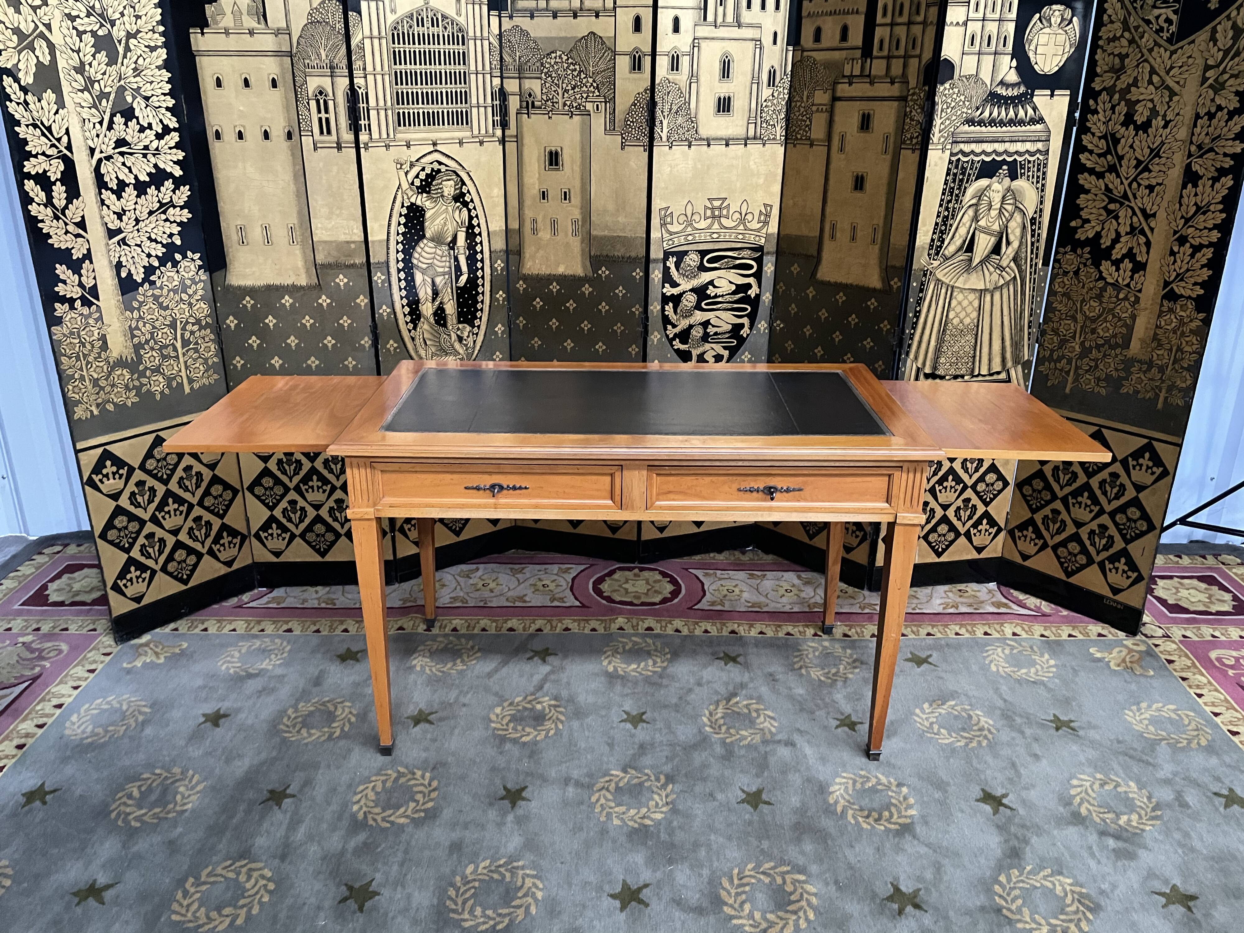 Desk full of Louis XVI style black leather