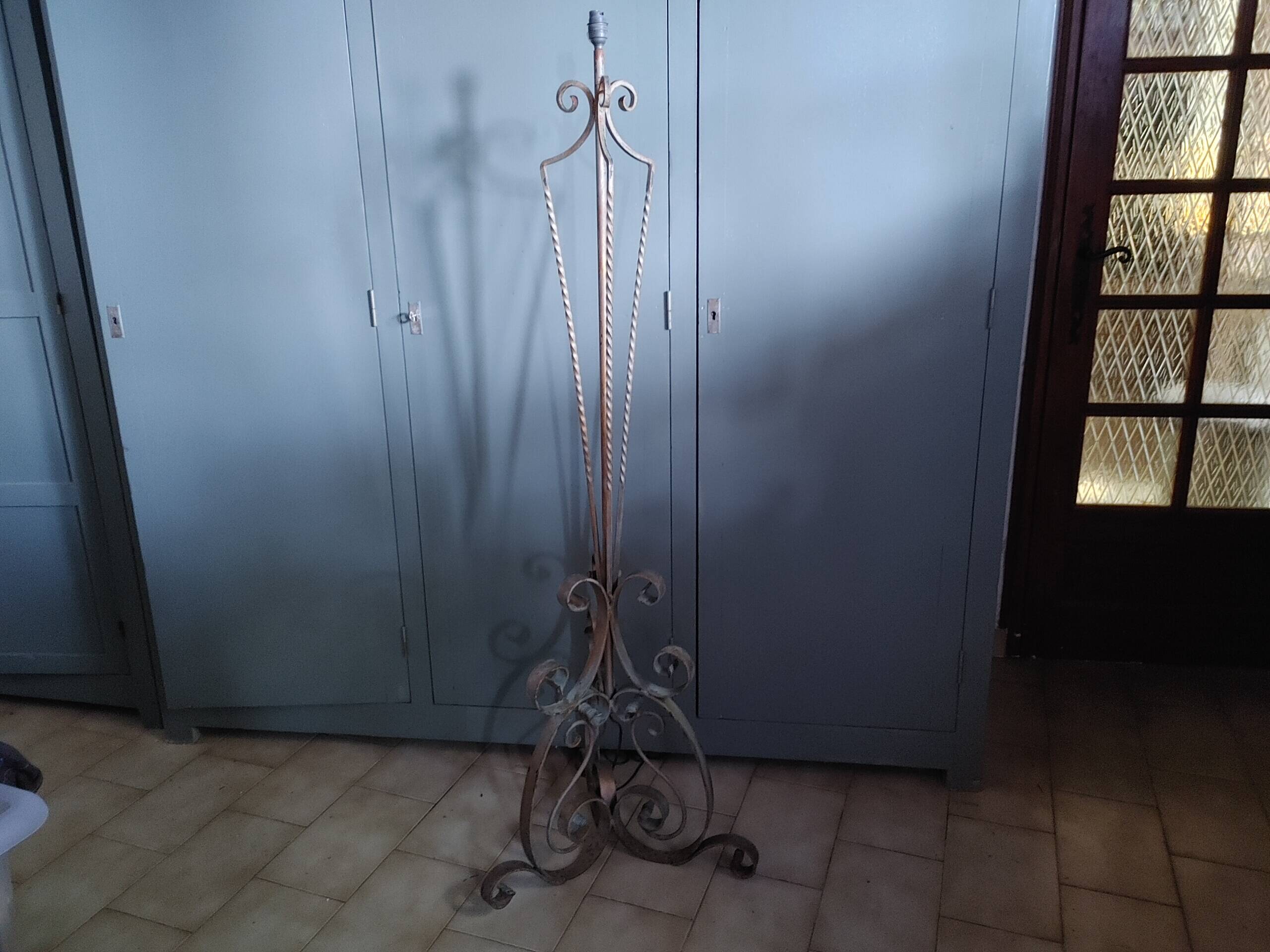 Twisted wrought iron floor lamp base, circa 1940