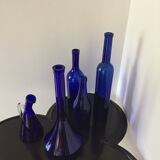 Series of five bottles / jars of cobalt blue apothecary