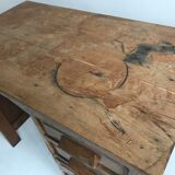 Accountant in solid wood desk