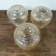 Set of 3 vintage amber textured glass globes/shades.