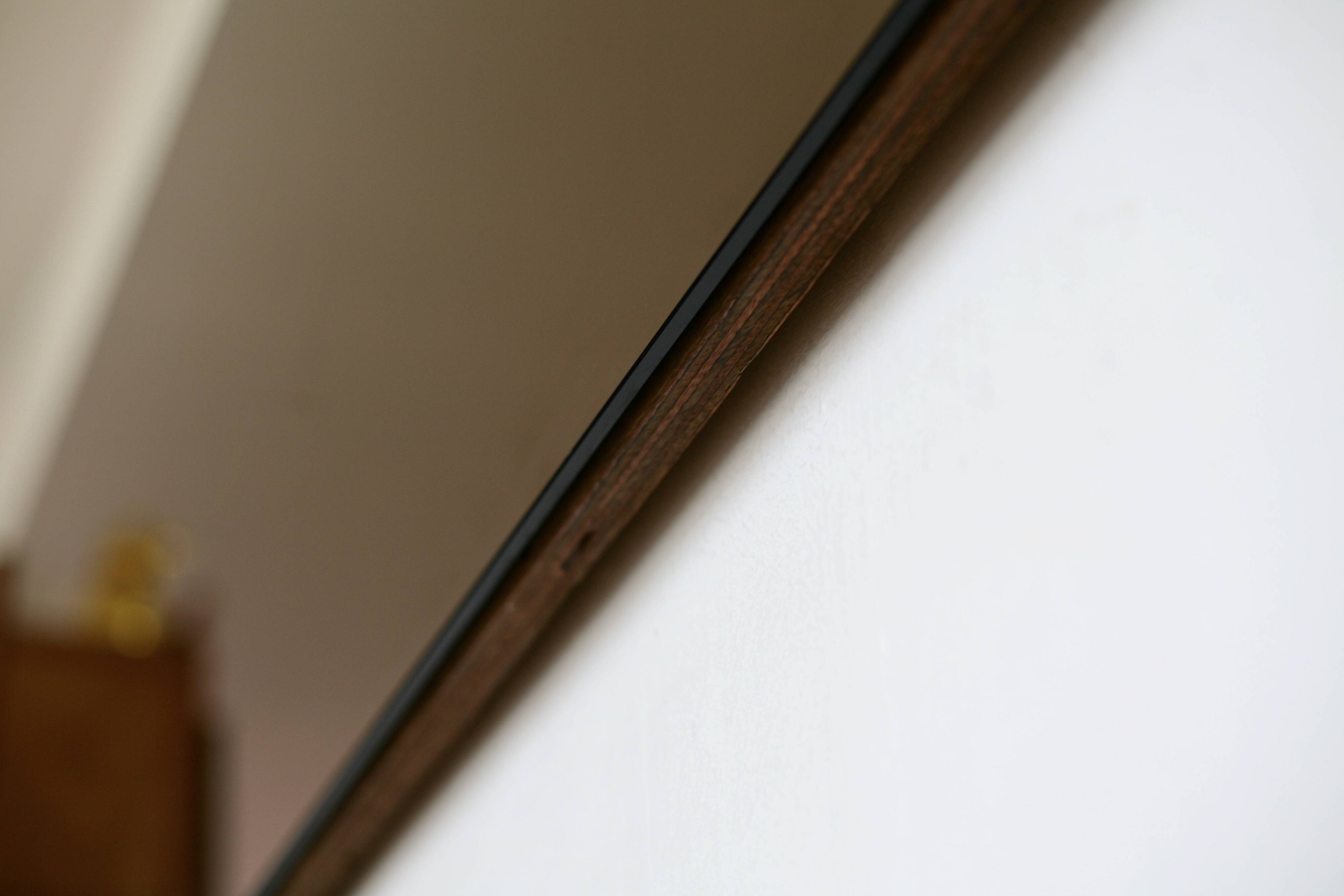 Grand miroir fumé encadrement asymétrique, années 70